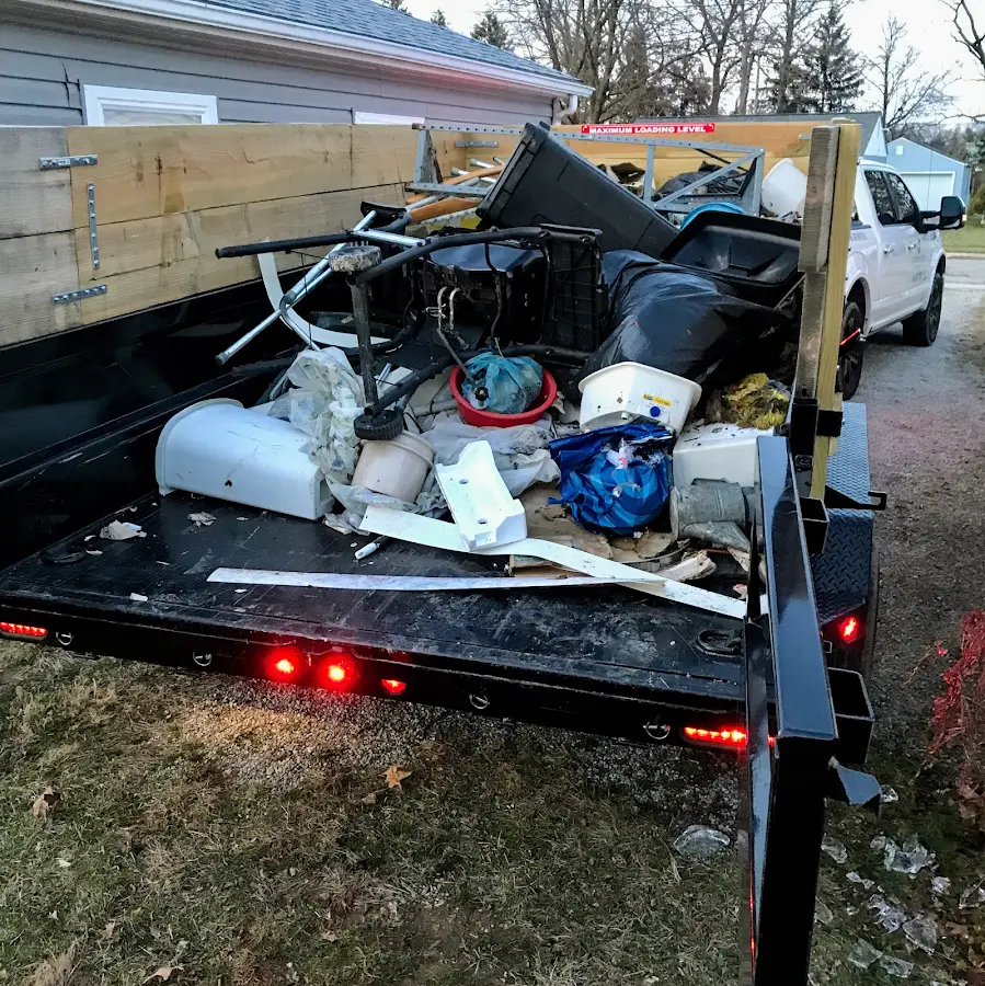 Roll-off dumpster delivered to a residential driveway in Wapakoneta